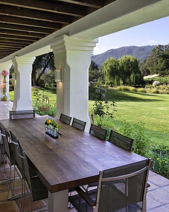 White-column loggia overlooking a Napa vineyard