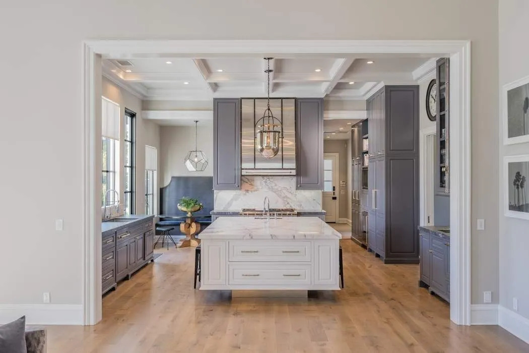Refinished kitchen cabinets with a smooth, durable finish